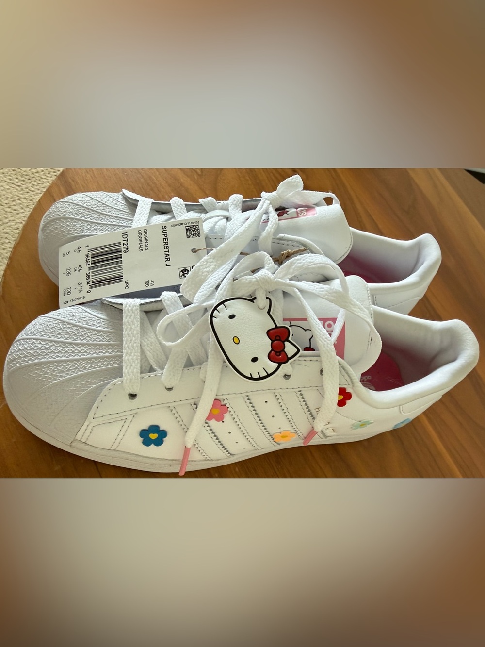 Adidas Youth Superstar J sneakers with Floral Accents & Hello Kitty Charm